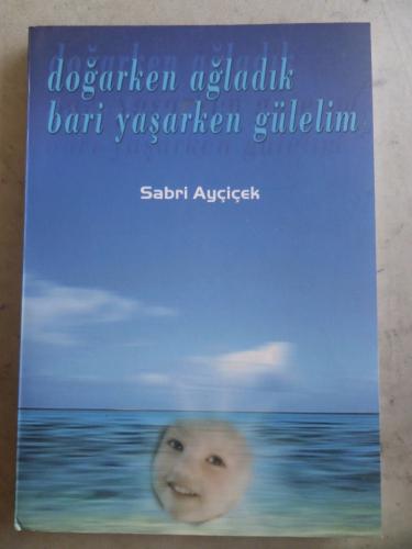 Doğarken Ağladık Bari Yaşarken Gülelim