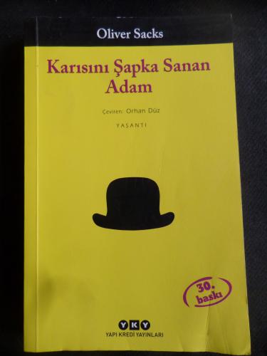 Karısını Şapka Sanan Adam